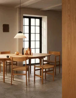 Carl Hansen & Søn Spisebordsstole<CH23 Spisestol, valnød olie med sort flet af Hans J. Wegner