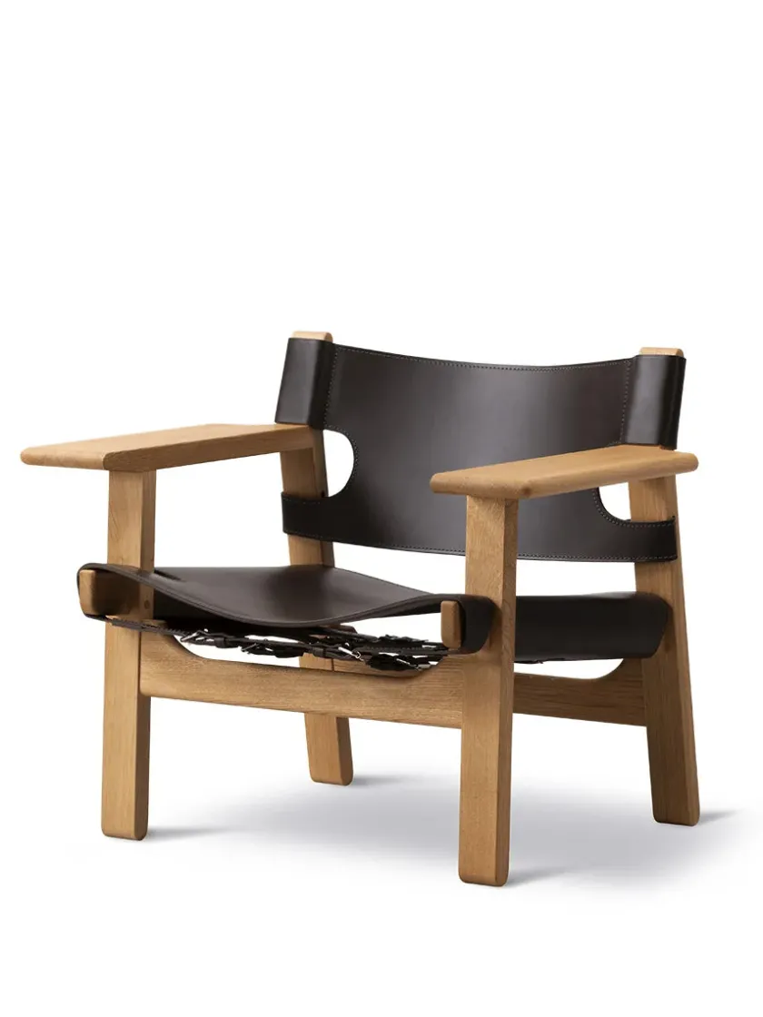 Fredericia Furniture Lænestole<Den Spanske Stol i sort læder, eg sæbe af Børge Mogensen