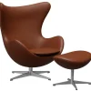 Fritz Hansen Lænestole<Ægget, Cognac Aura læder, med returdrej inkl. skammel af Arne Jacobsen