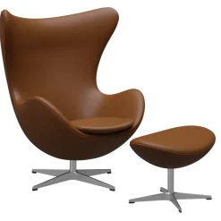 Fritz Hansen Lænestole<Ægget, Valnød Aura læder, uden returdrej inkl. skammel af Arne Jacobsen