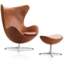 Fritz Hansen Lænestole<Ægget, Valnød Essensial læder, uden returdrej inkl. skammel af Arne Jacobsen